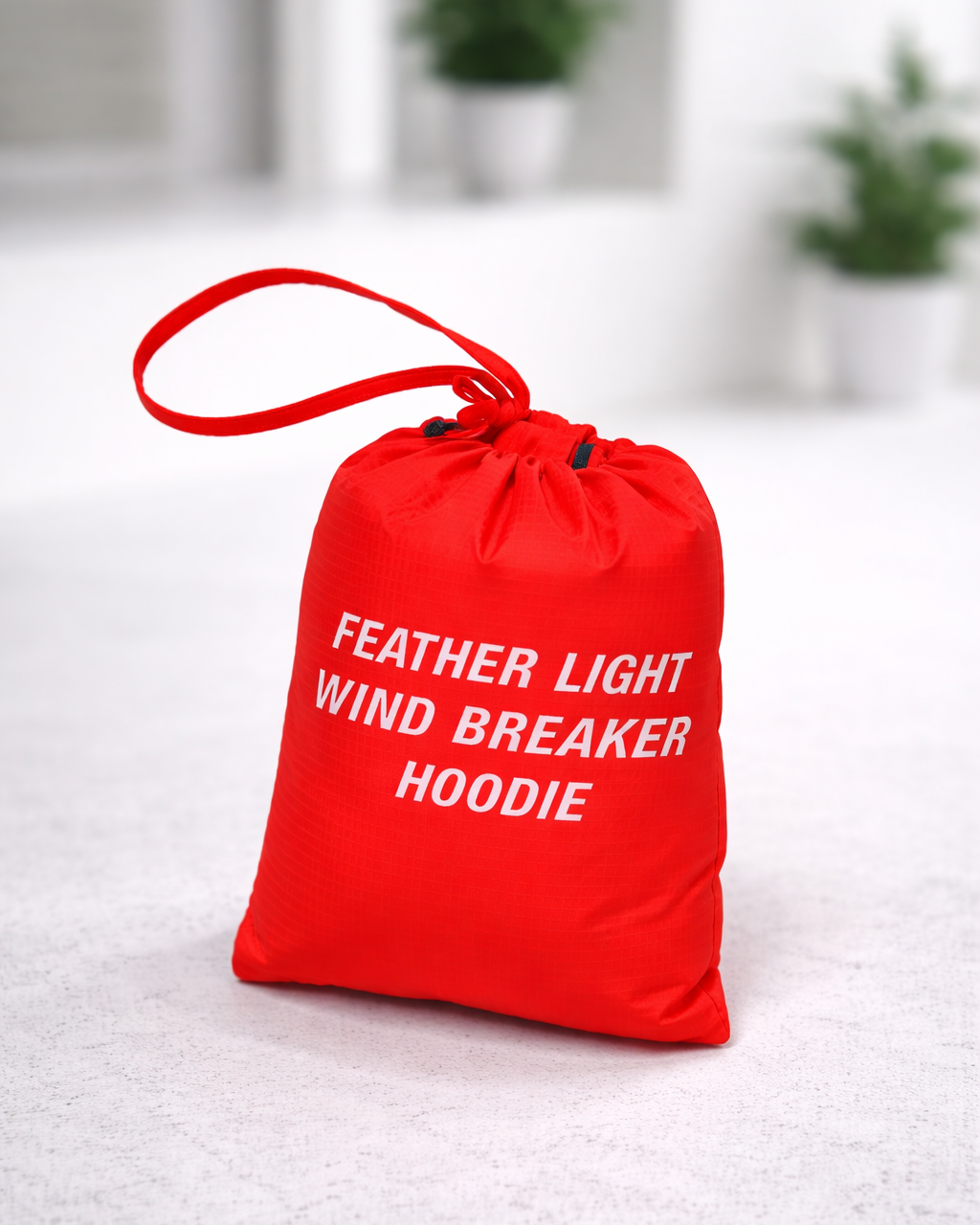 Pocketable Windbreaker Hoodie Unisex - Comrades 2026